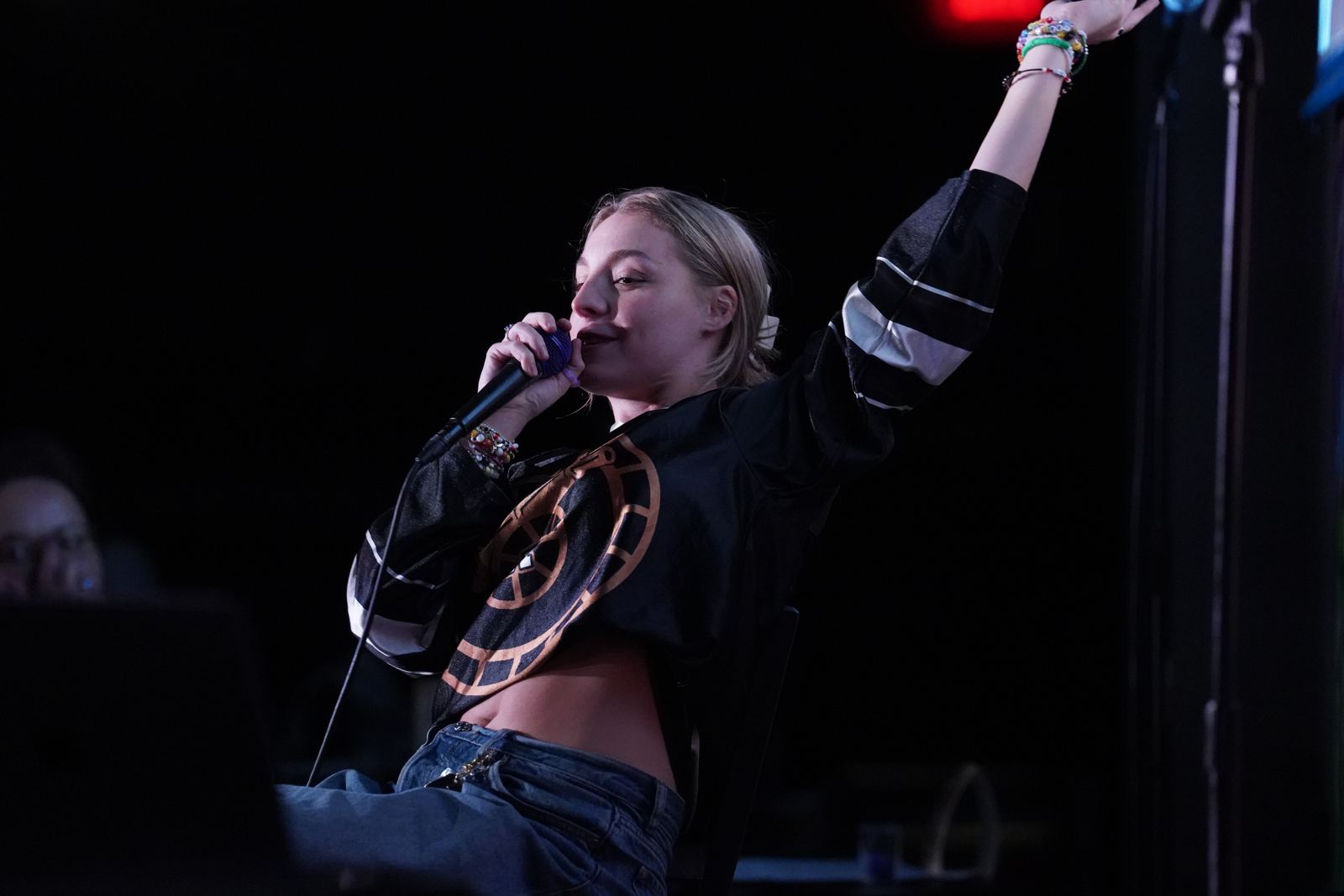 Madison leaning back with the mic stand, Indianapolis