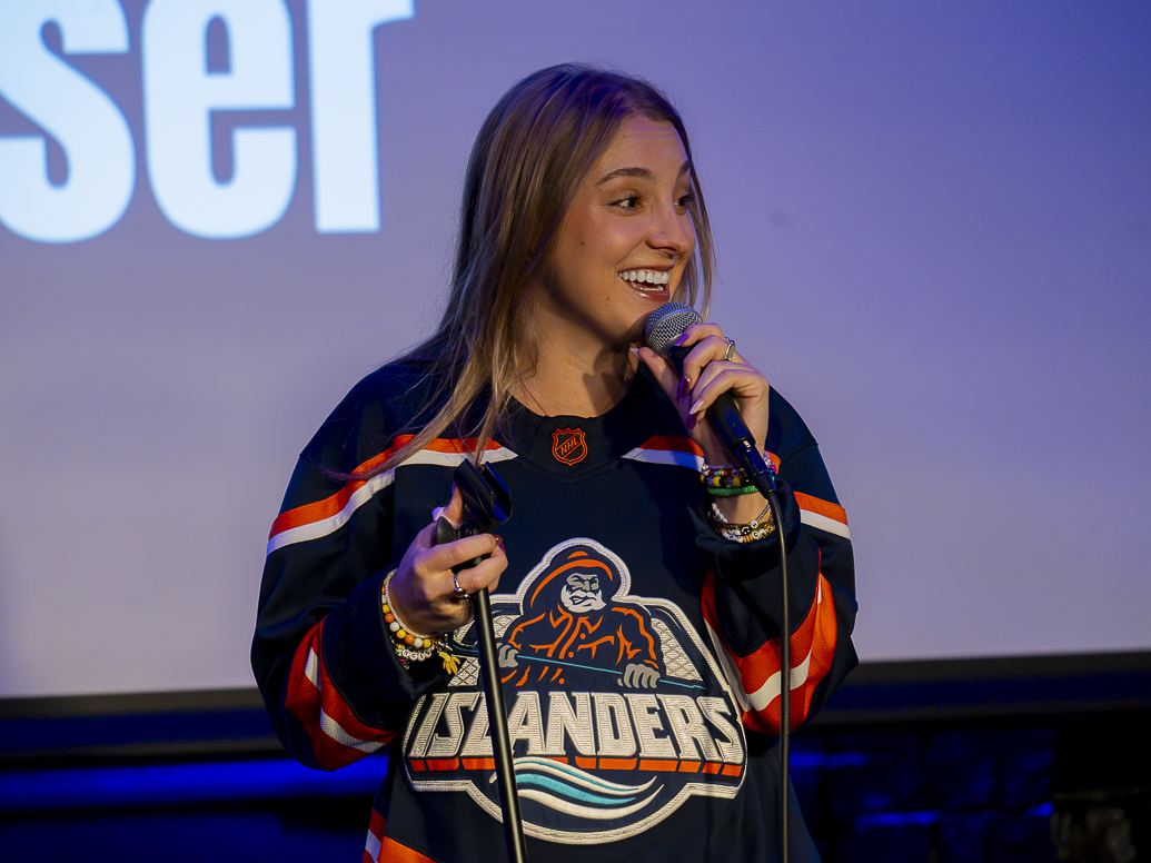 Madison smiling into the mic in an Islanders jersey, Las Vegas